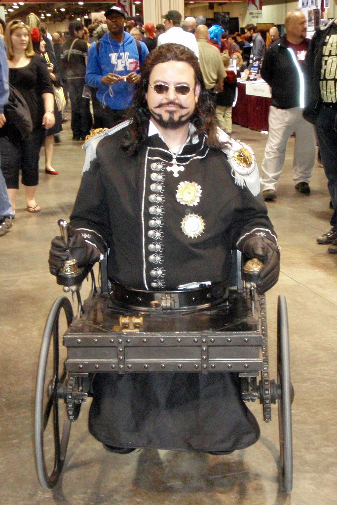 what is Steampunk:arliss-loveless-character-in-steampunk-wheelchair-costume-from-the-1999-film-wild-wild-west