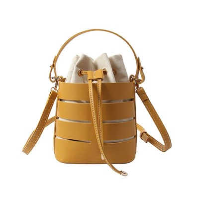 2019 New Tide Solid Color Hollow PU Material Small Fairy Bag Portable Bucket Bag Casual Wild Single Shoulder Messenger Bag